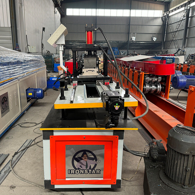 30-50m/min fast speed cutting rolling shutter door roll forming machine in Brazil Raw material: Galvanized steel